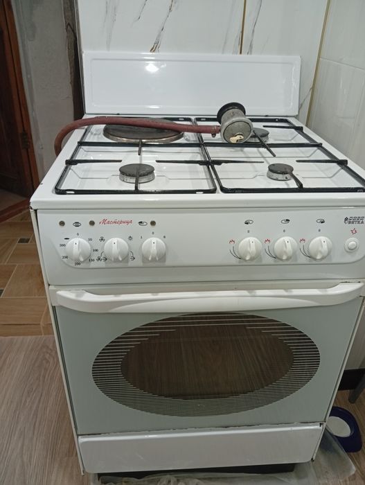 Газ плита с электрической духовкой