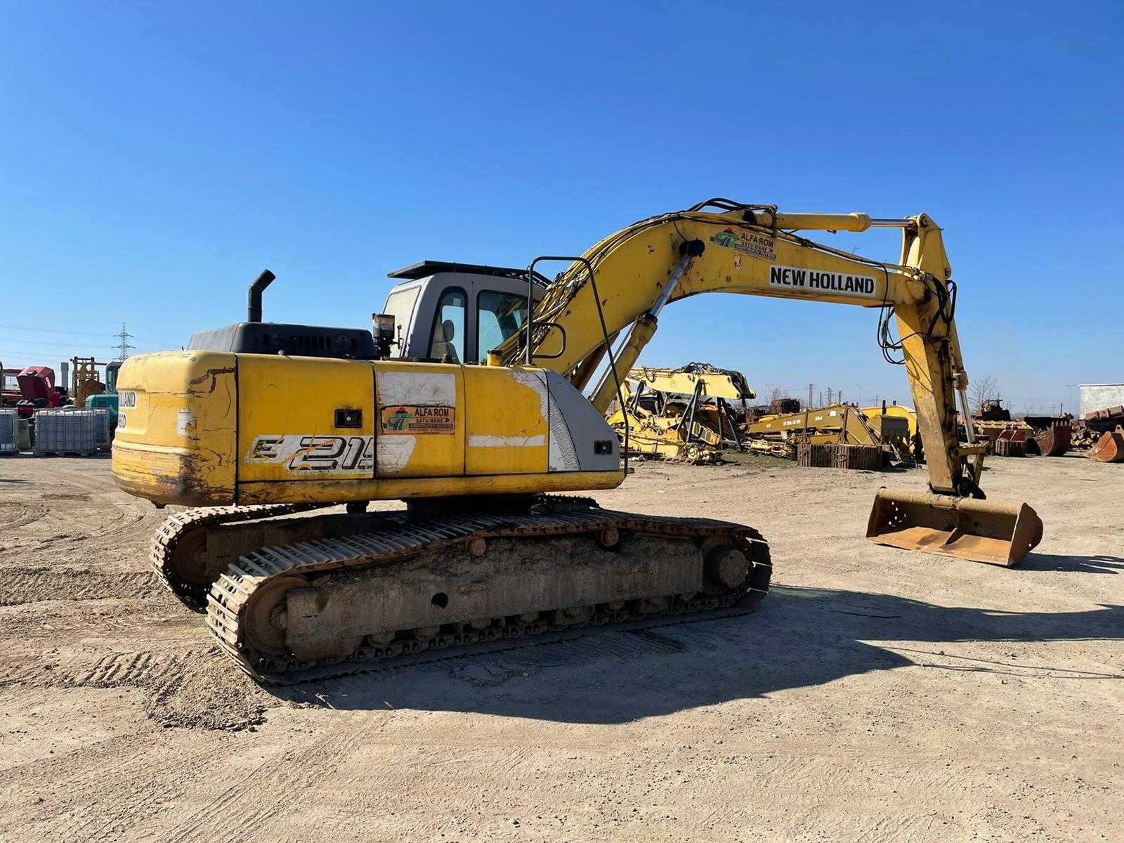 Excavator senile New Holland E 215 dezmembrez