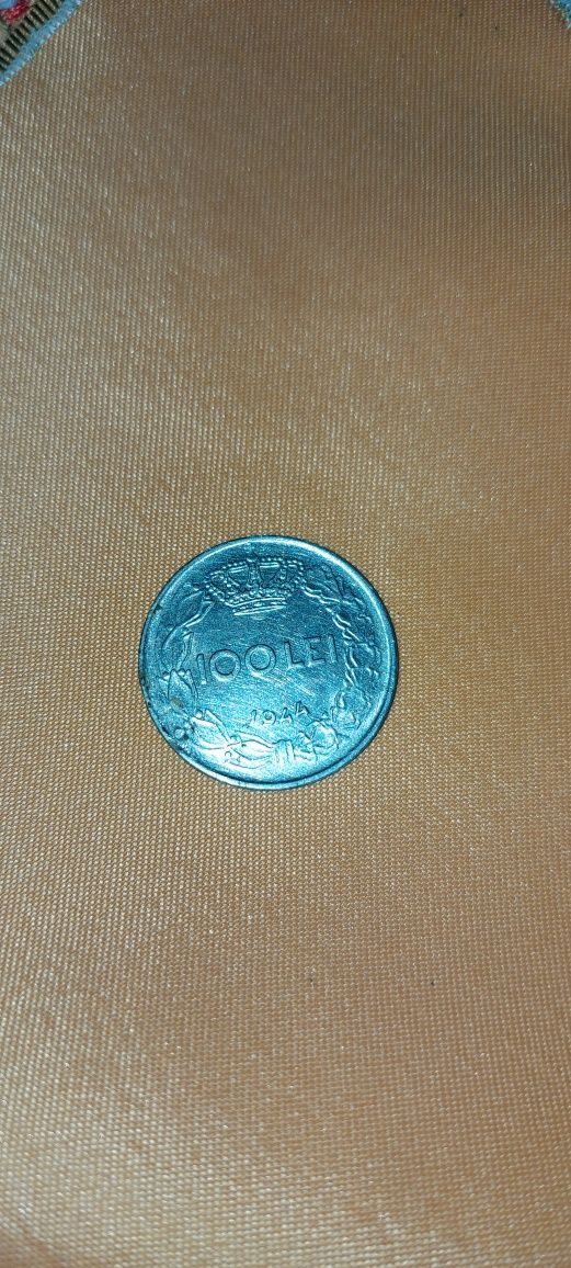 Vând moneda 100 lei cu Regele Mihai I an 1943-1944