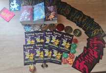 9 pachete cu cărți pokemon din seria trick or trade+ 3 albume+ 65 foli
