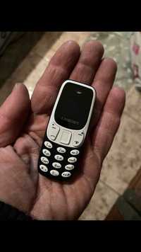 Най малкият телефон в света !