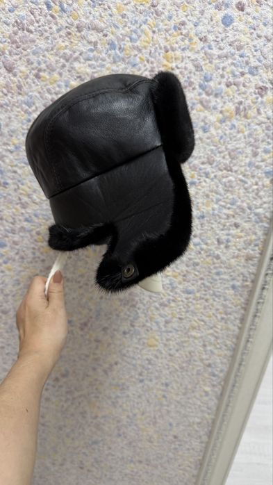 Продам новую шапку-ушанку унисекс норка /кожа