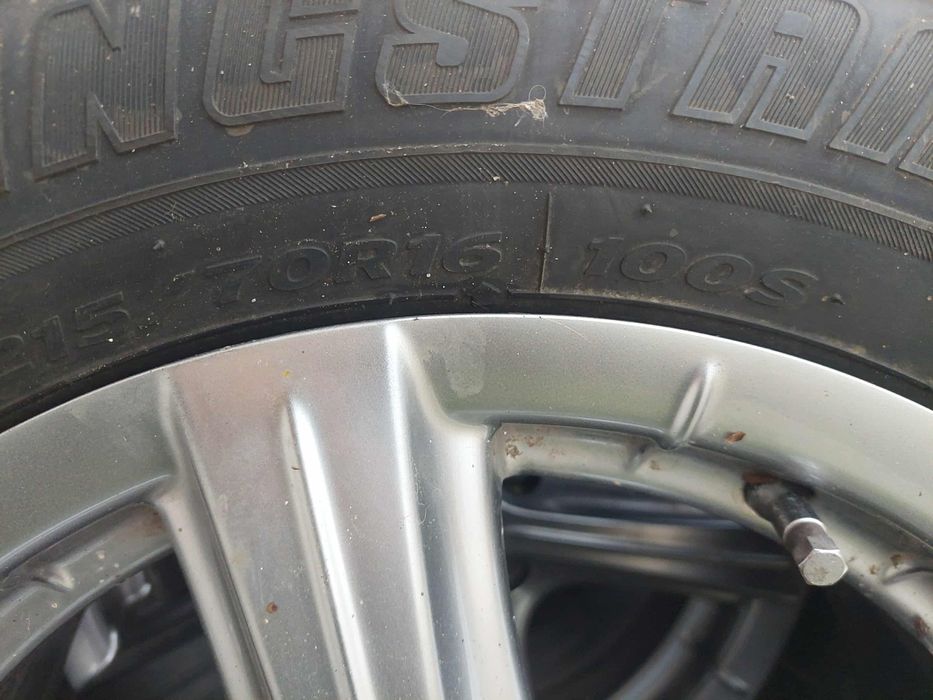 Vând 4 roti MS iarna-vara SUV 215 70 R16