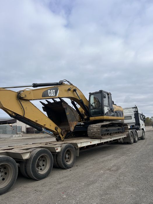 Услуги гусеничного Экскаватора ковш 1.8