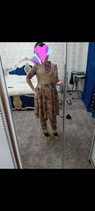 Женская одежда платья