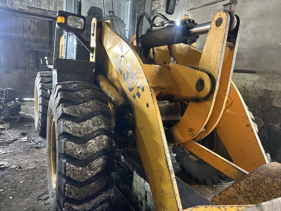 Погрузчик двух кубовый китай 2014