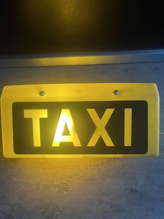 Firma Taxi decorativa