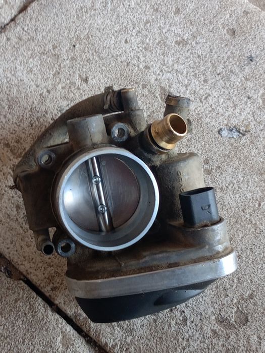 Продам дроссельную заслонку на Опель астра h 1,6 25000 тг