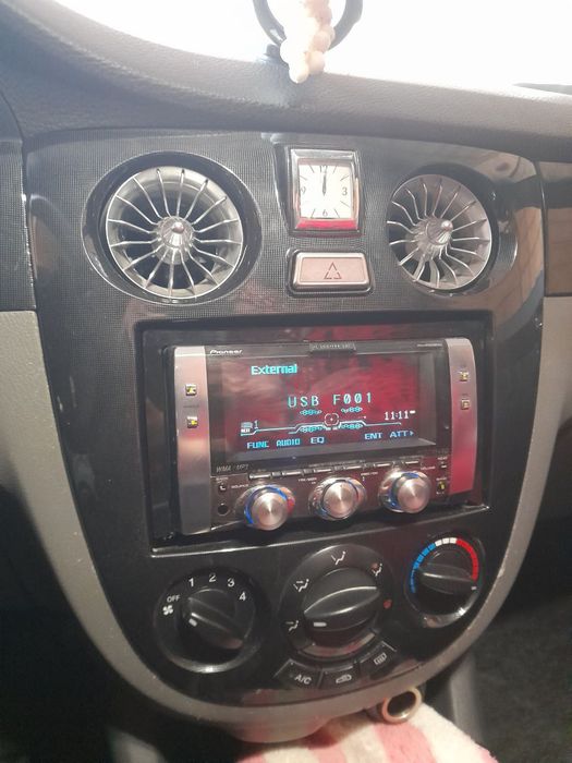 CARROZZERIA. 009+Pioneer CD 100 UB.