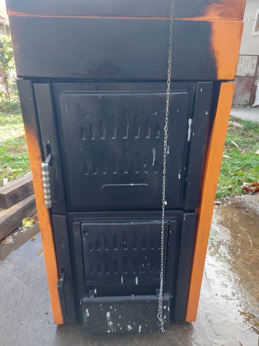 Vând centrala incalzire Ferolli pe lemne/carbune 30 kw