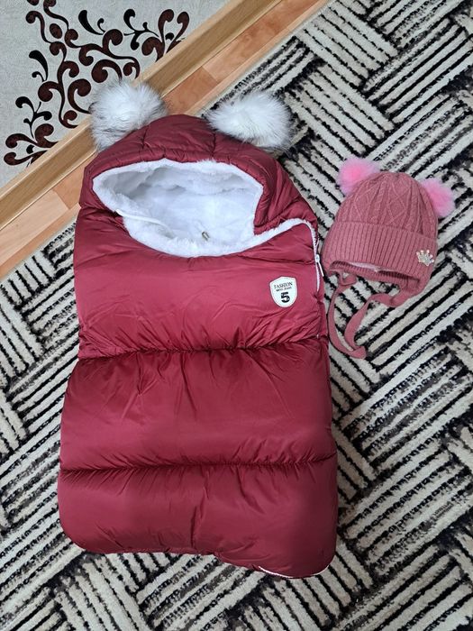 Продам зимний конверт новый шапочка в подарок