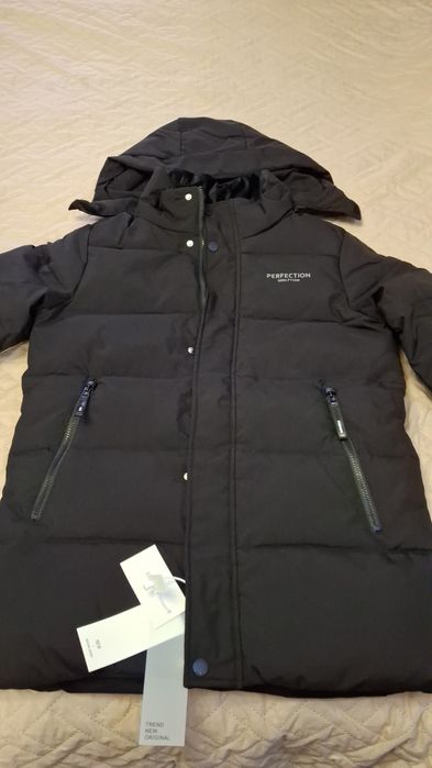 Продам новый зимний пуховик для мальчика 14-16 лет.