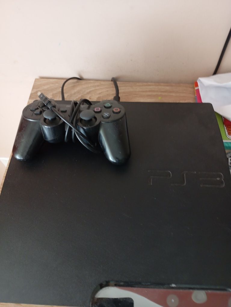 Vând PS3 slim cu 13 jocuri