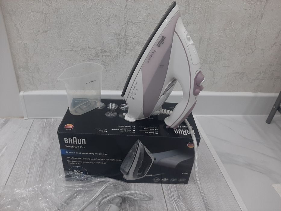 Утюг б/у но работает нормально, фирмы Braun