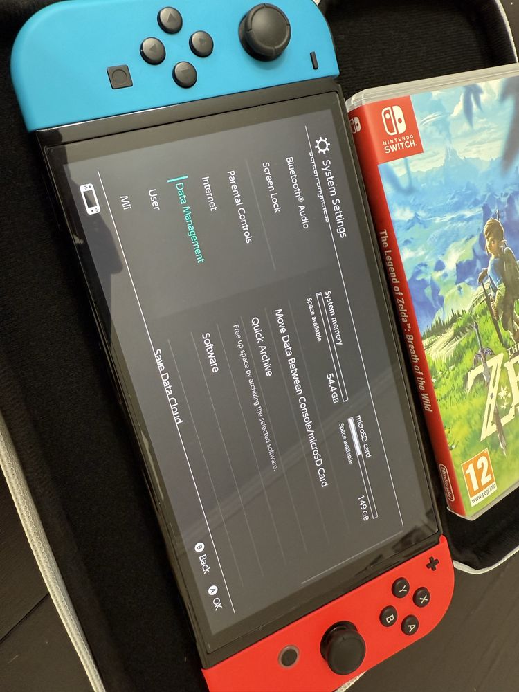 Nintendo Switch 64 GB OLEF 7” + Zelda The Breth of the Wild and Case