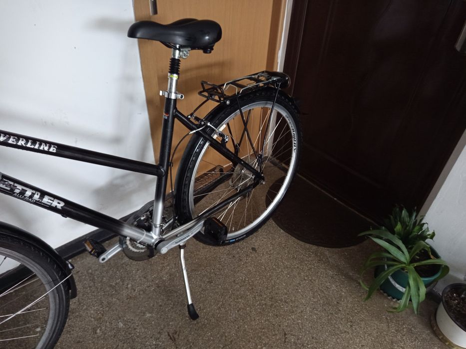 Bicicleta din aluminiu in stare de funcționare.