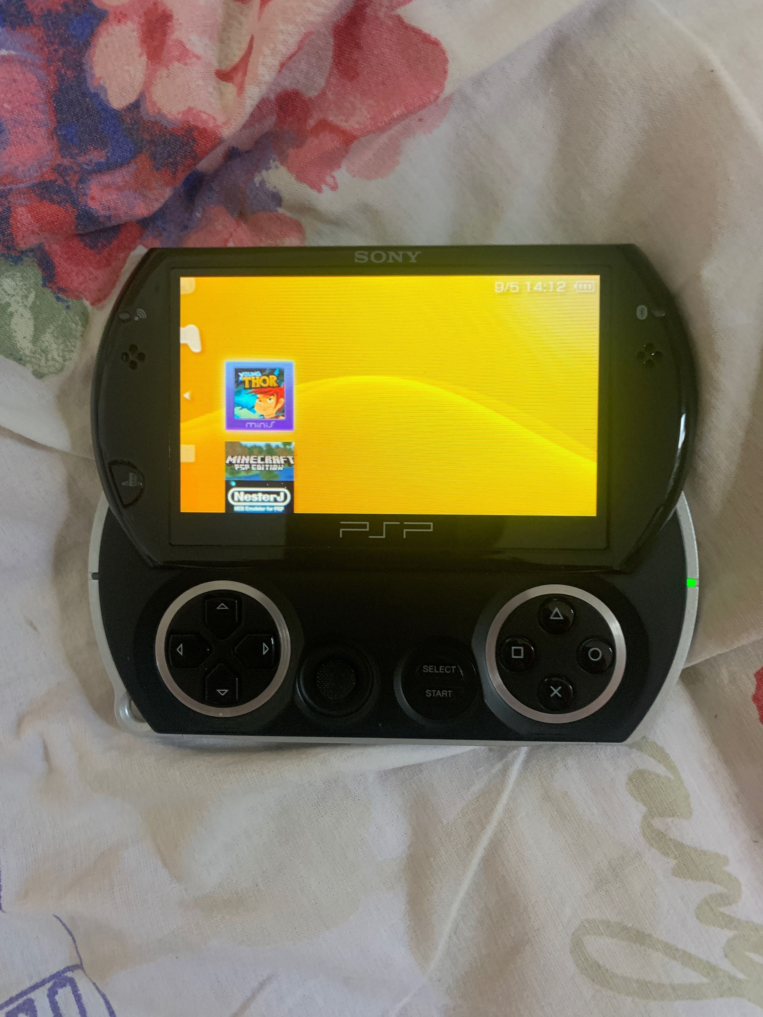consola portabila psp go modata