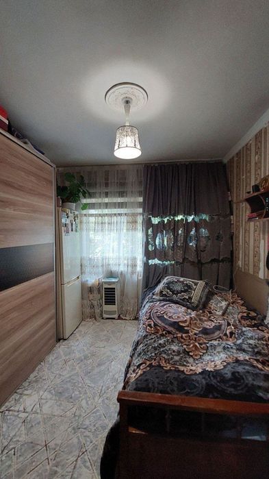 2 ком. квартира, 2/2/4 в бывшем общежитии. Сергели 2. До метро - 500 м