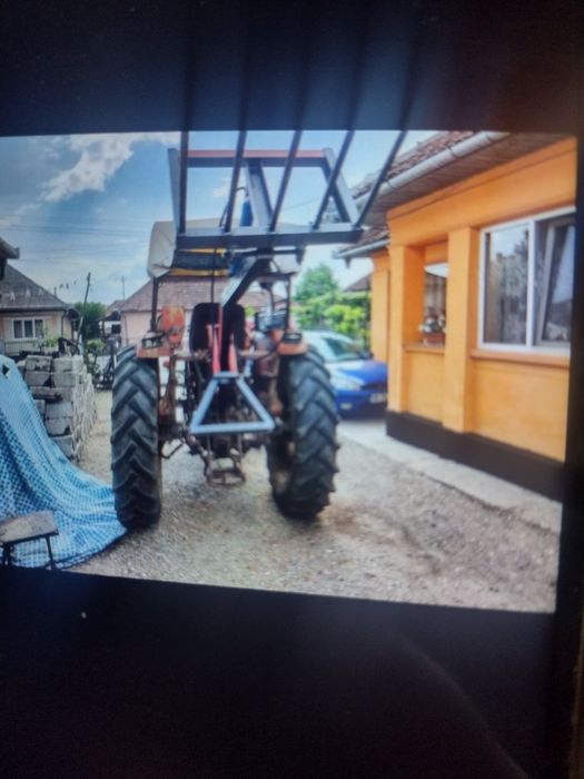 Încărcător in tirant