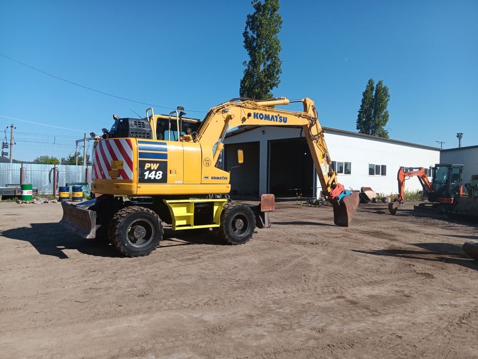 Vând sau schimb excavator komatsu PW 148