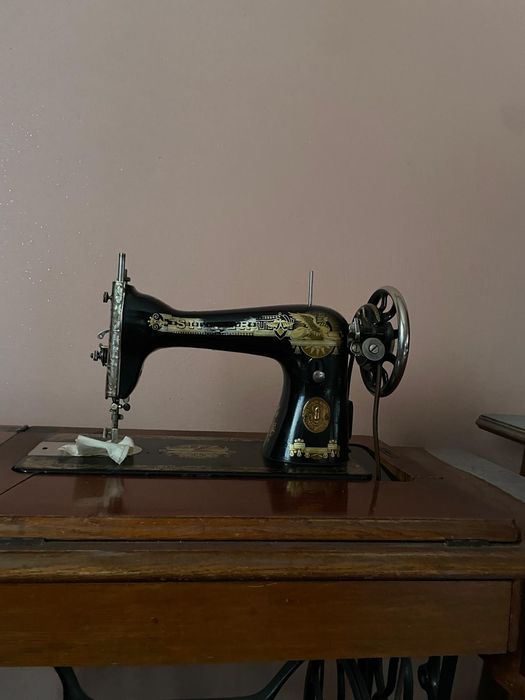 Masna de cusut Singer