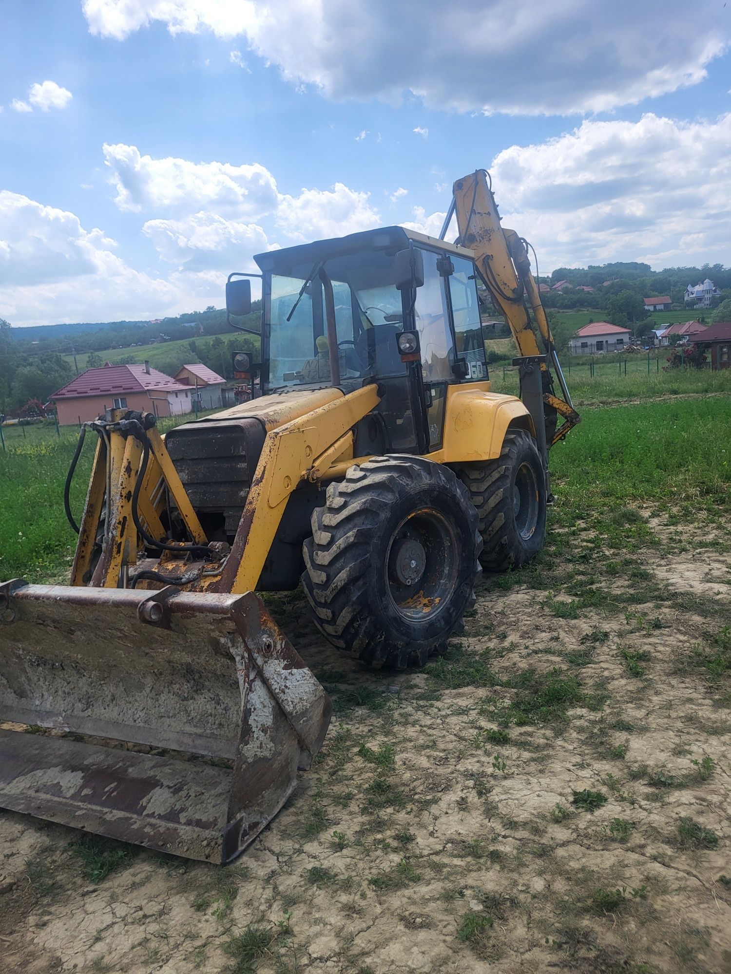 Vând buldoexcavator fermec