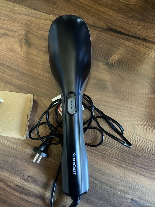 Четка за коса с топъл въздух