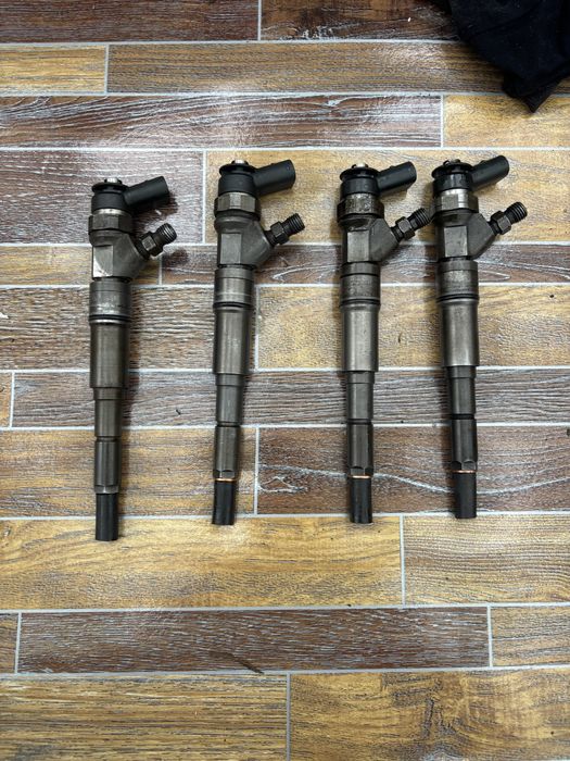 Injectoare bmw e46 150cp