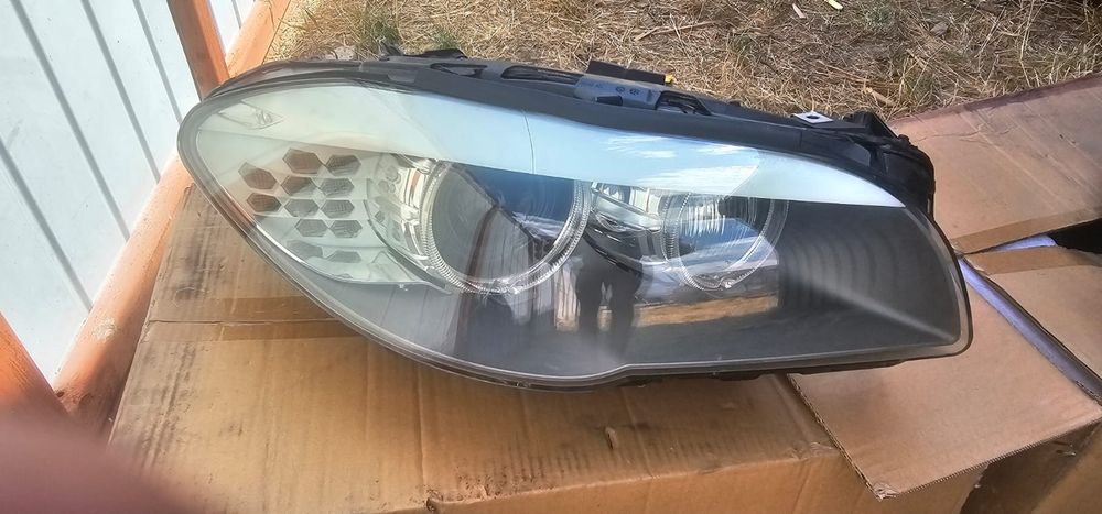 Faruri bmw f10 originale pret 4300 lei fix