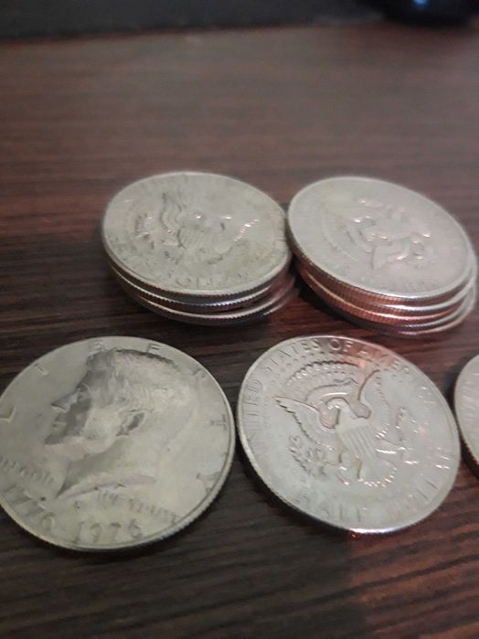 монети 1 $ и половин $