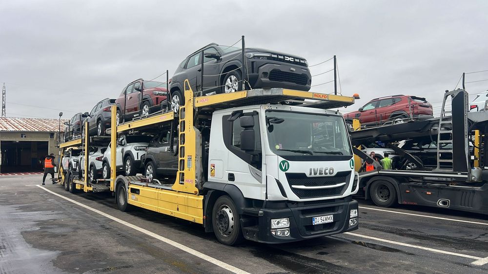 Transport autoturisme pe platforma GERMANIA Belgia Olanda Italia