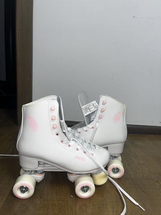 Role cu patru roți Oxelo – Alb-Roz, Ca Noi!