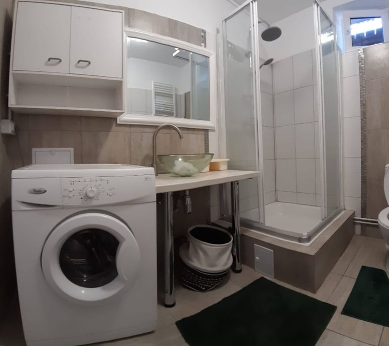 Garsoniera  mare la curte cu utilități incluse