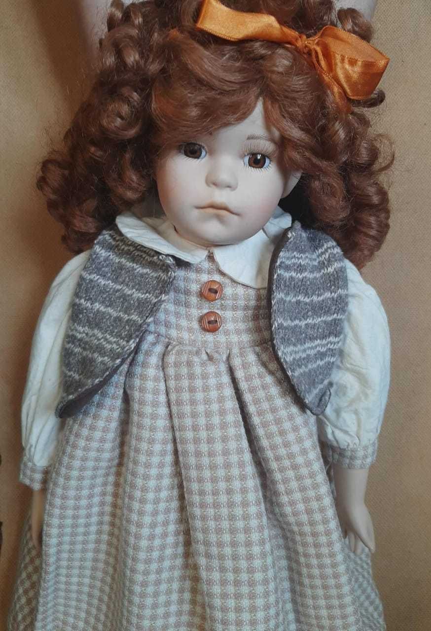 Продам красивую коллекционную куклу(58 см)
