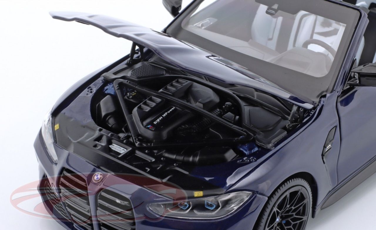 BMW M4 Cabriolet (G83) year 2021 dark blue metallic 1:18 Minichamps