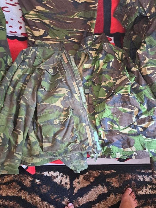 Haine și geci vânătoare sau pescuit