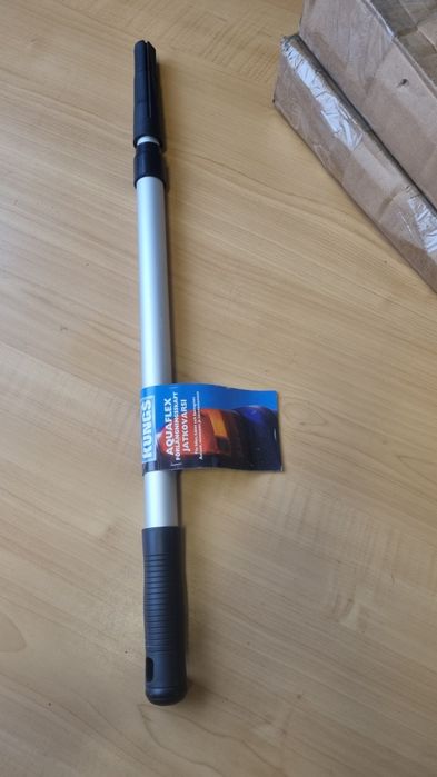 Bat extensibil pentru racleta
