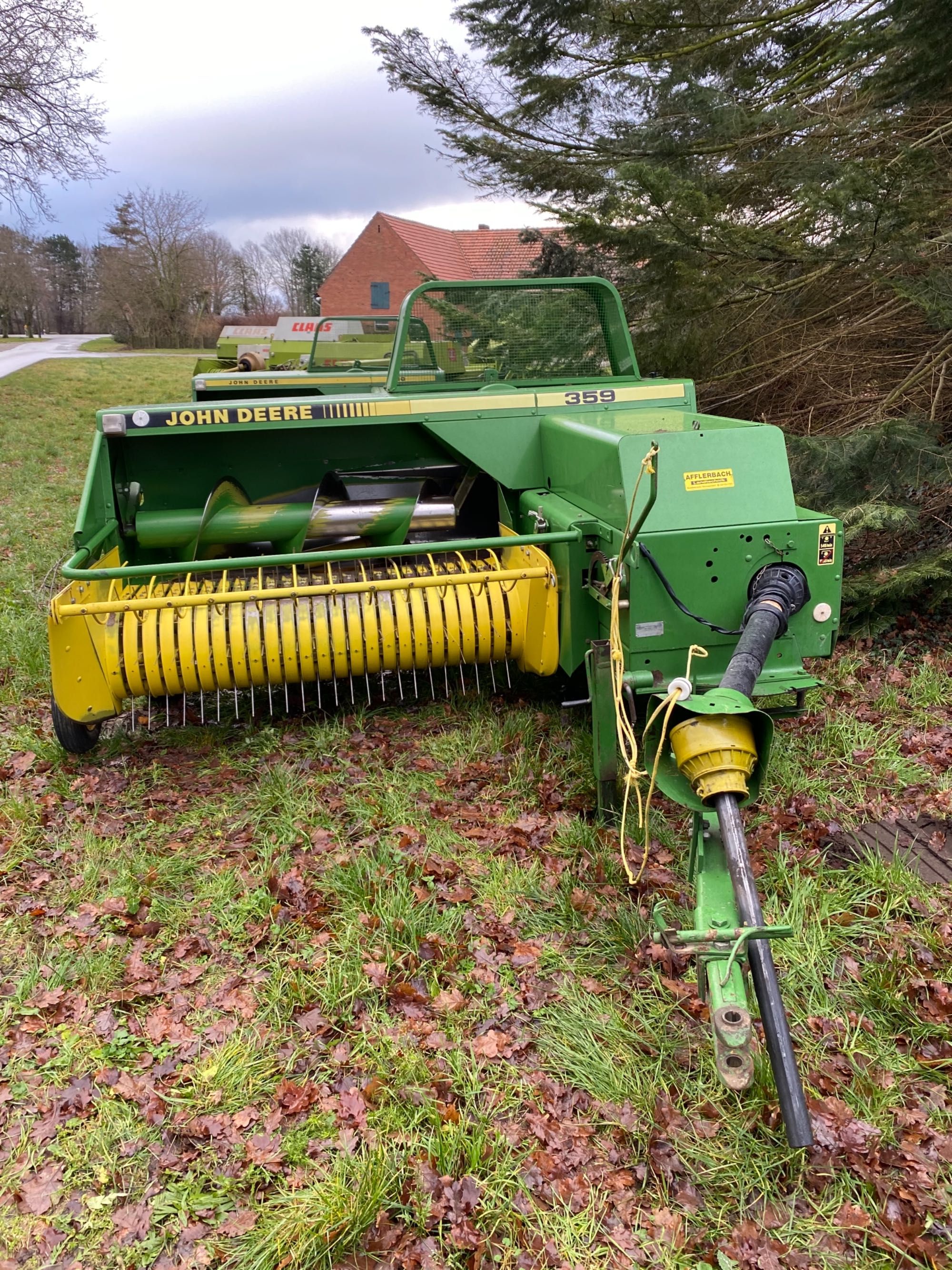 John Deere press Podborshik