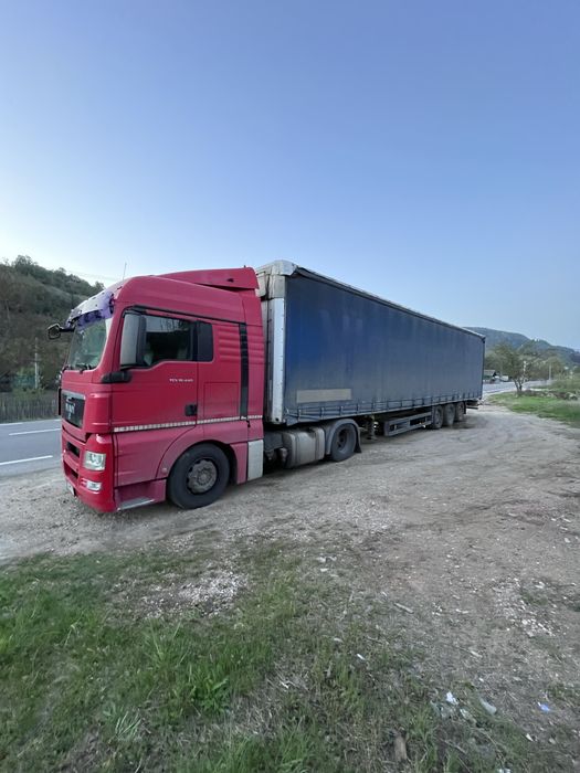 Man TGX+semiremorca Schmitz