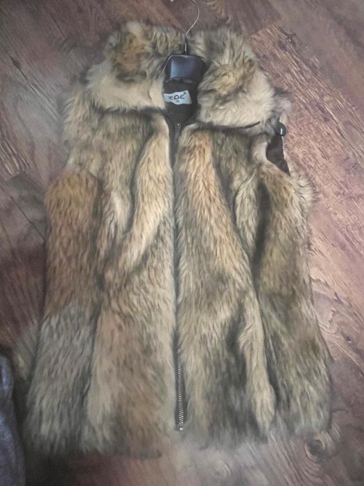 Дамски пухен елек