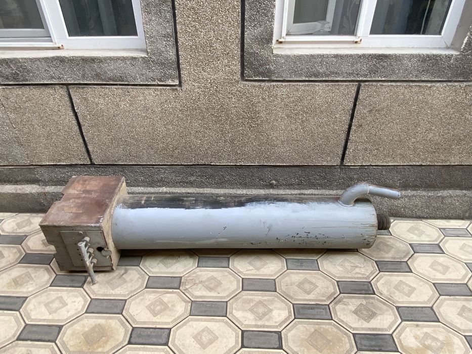 Катёл с горелкой.