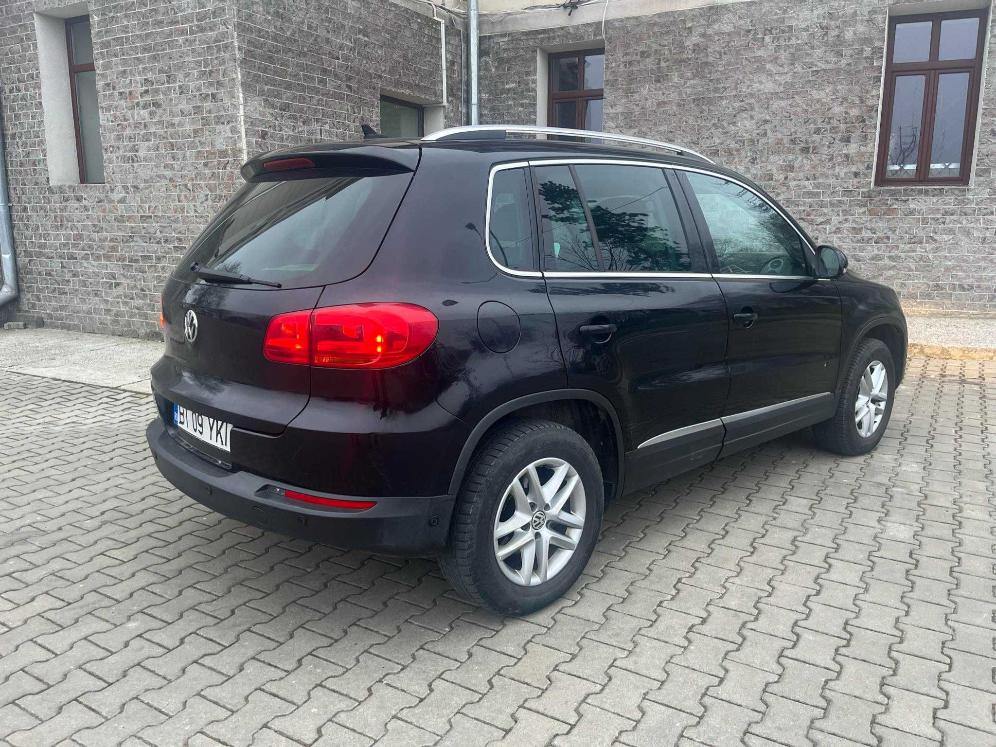 Vand masina tiguan