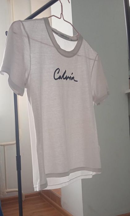 Футболки Calvin Klein, Lacoste, Balmain, Armani