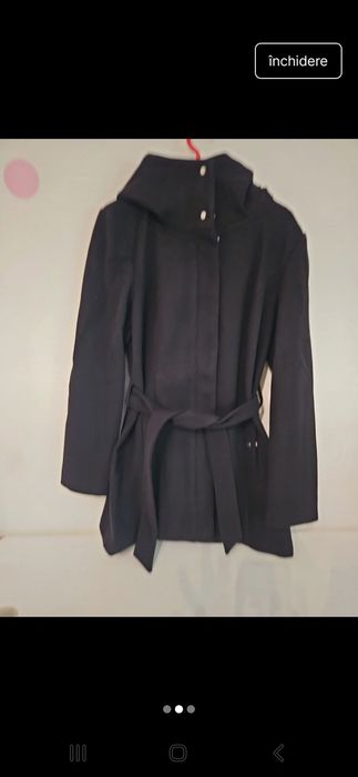 Palton nou cu eticheta