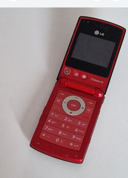 Telefon cu clapeta lg cu încărcător original