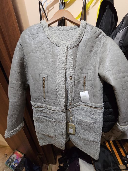 Новая двусторонняя дубленка 10000