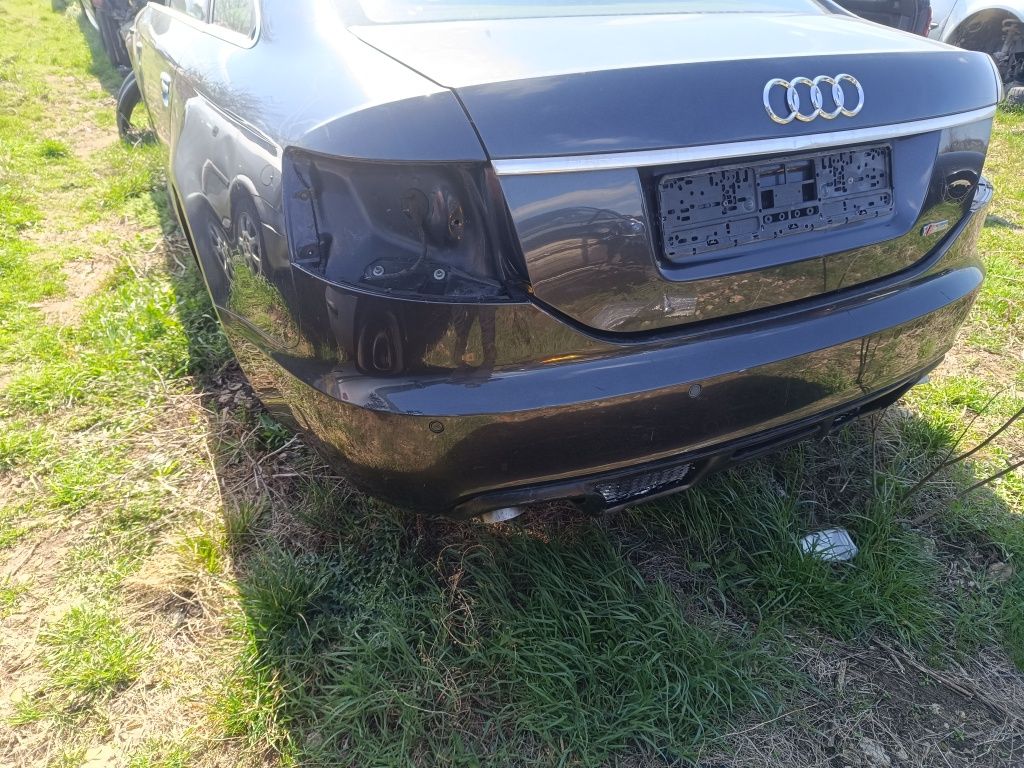 Bara spate Audi A6 C6 berlina evacuare dubla