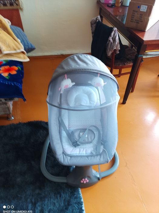 Продам детский шезлонг новый