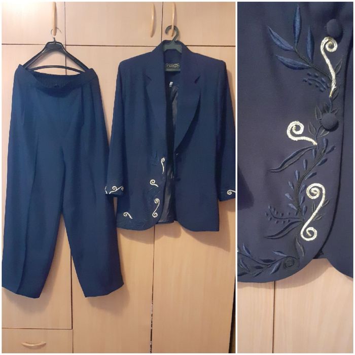 Костюмы женские с брюками.