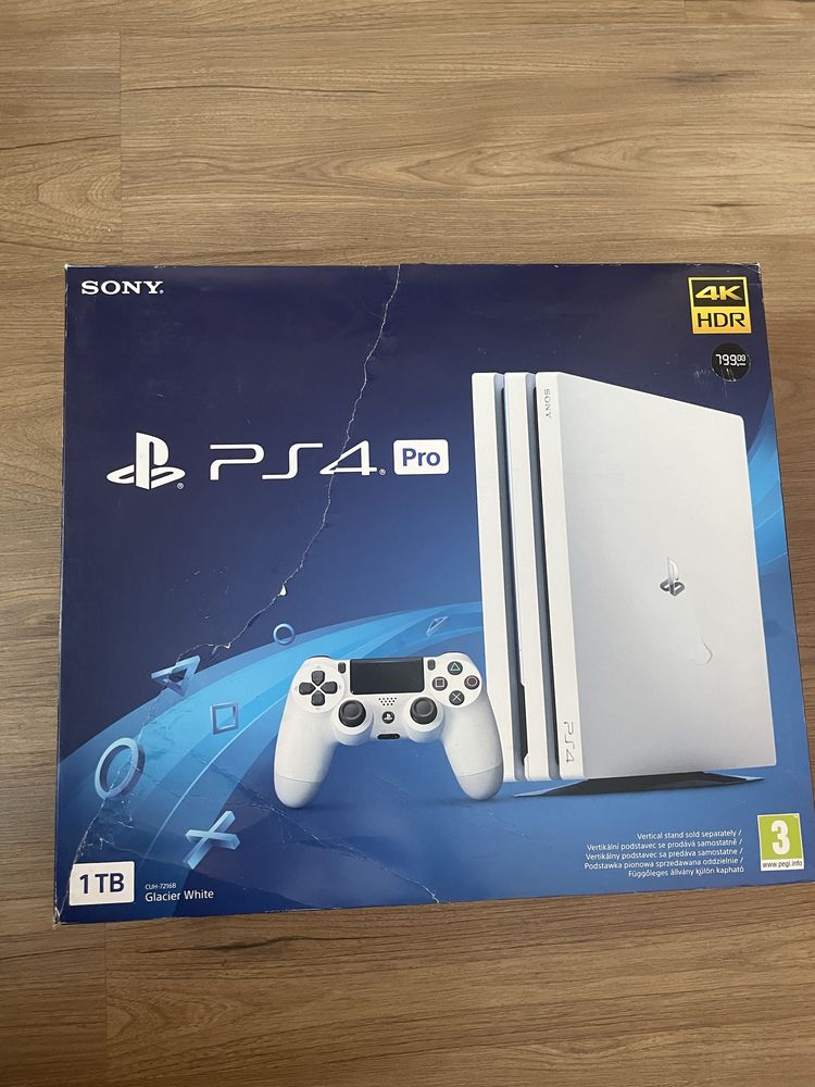 PS4 Pro + 2 контролера + 8 игри + зарядна станция